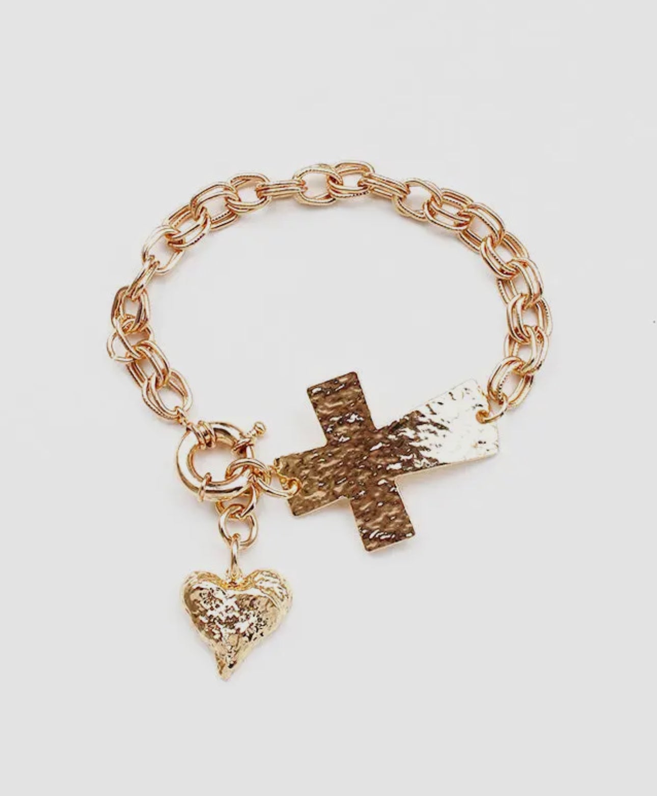 Gold Hammered Cross and Gold Heart Charm
Toggle 7.5" Bracelet