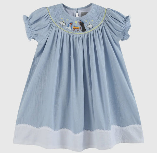Light Blue Nativity Smocked Bishop
Sleeve Dress